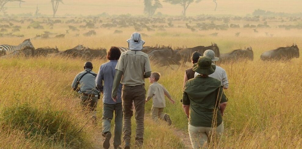 family walking safari serengeti